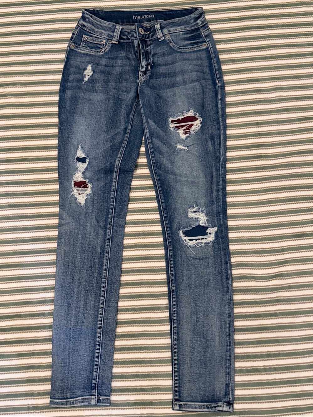 MAURICES Women’s distressed jeans. Front rip holes have material sewed in